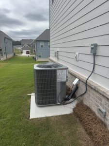 Outdoor HVAC unit showing equipment location, installation area, and surrounding clearance.